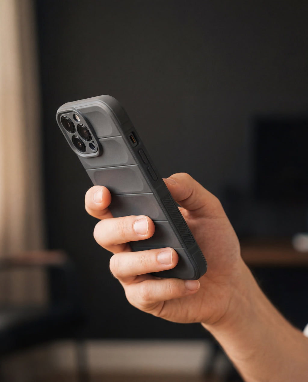 OnlyCovers LB iPhone case in Gray - hand-held lifestyle